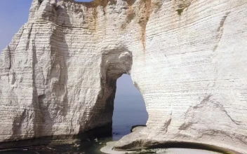 Stock Video Arch Under A Coastal Cliff For PC