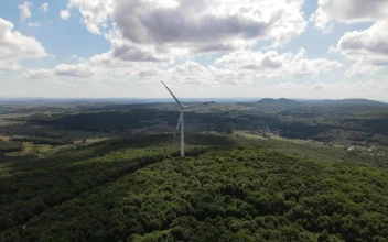 Stock Video Approaching A Wind Turbine Aerial Shot For PC