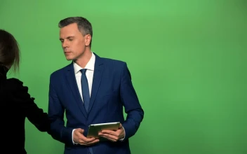 Stock Video Applying Make Up To Newscaster On A Green Screen For PC
