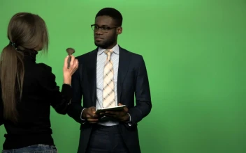 Stock Video Applying Make Up To News Presenter On Chroma Key For PC