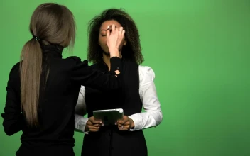 Stock Video Applying Make Up To News Presenter For PC