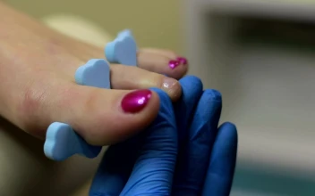 Stock Video Applying Color To Nails For PC