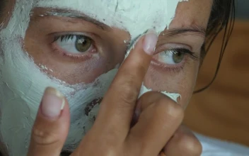 Stock Video Applying A Beauty Mask Close Up For PC