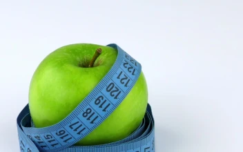 Stock Video Apple And Measuring Tape On White Background For PC