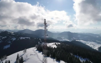 Stock Video Antenna Tower In A Snowy Mountain Range For PC