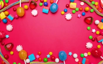 Stock Video Animated Stop Motion Frame Of Candies On A Pink Background For PC