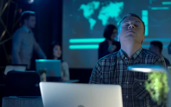 Stock Video An Exhausted Man At Work Close His Laptop For PC