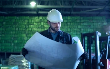 Stock Video An Engineer Working Through The Warehouse For PC