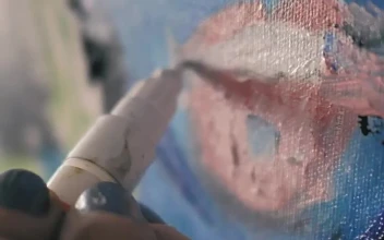 Stock Video An Artists Hand Detailing An Abstract Portrait For PC