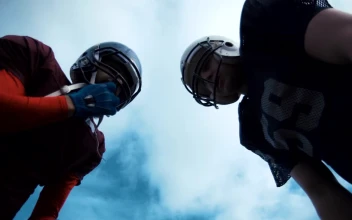 Stock Video American Football Players Discussing Tactics For PC