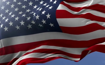 Stock Video American Flag Waves In Slow Motion While Zooming Out For PC