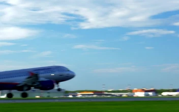 Stock Video Airplane Taking Off In The Sun For PC