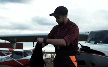 Stock Video Airplane Mechanic Looking Into The Distance For PC