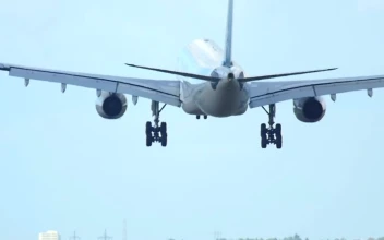 Stock Video Airplane Landing In Slow Motion Back View For PC