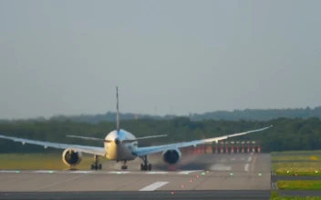 Stock Video Airplane From Behind Going Through The Airport Track For PC