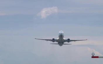 Stock Video Airplane Crossing The Cloudy Sky For PC