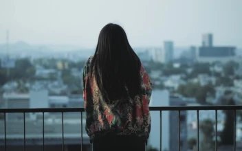 Stock Video A Young Womans Portrait On A Balcony For PC