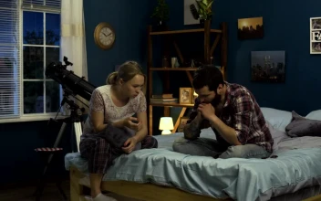Stock Video A Young Couple Having A Quarrel At Home For PC