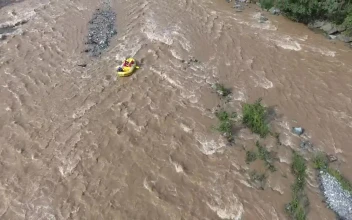 Stock Video A Yellow Boat In The River Rapids For PC