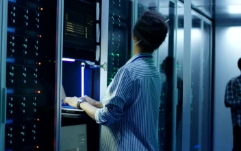 Stock Video A Woman Working With A Computer In The Server Room For PC