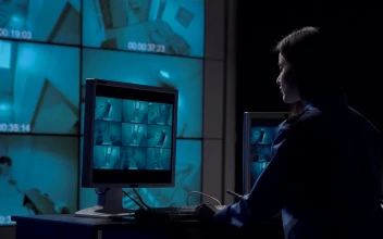 Stock Video A Woman Working On The Security Camera Room For PC