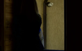 Stock Video A Woman Receiving A Package From Delivery Guy For PC