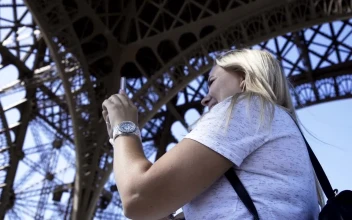Stock Video A Woman Making A Video Call Under The Eiffel Tower For PC