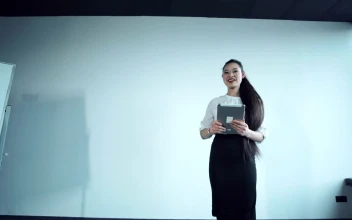 Stock Video A Woman Invites The Speaker To The Stage For PC