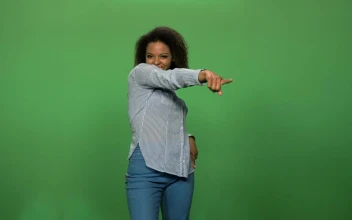 Stock Video A Woman Dancing In Front Of A Green Screen For PC