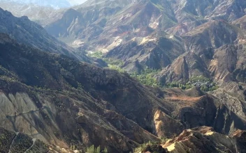 Stock Video A Village Between A Mountainous Valley For PC