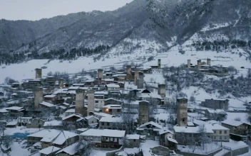 Stock Video A Town With Old Towers Covered In Snow For PC