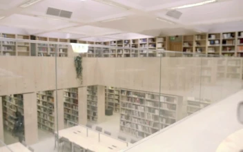 Stock Video A Tired Student In The Library For PC
