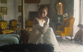 Stock Video A Tattooed Vintage Woman In An Old Fashioned Bedroom For PC