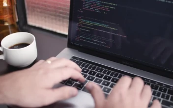 Stock Video A Software Developer Working And Drinking Coffee For PC
