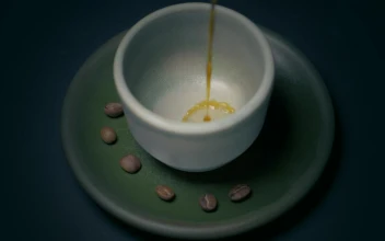 Stock Video A Small Cup Of Coffee Being Filled For PC