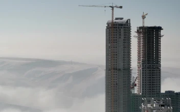 Stock Video A Skyscraper Under Costruction Above The Clouds For PC