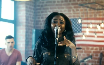 Stock Video A Singer Performing With A Band Indoors For PC