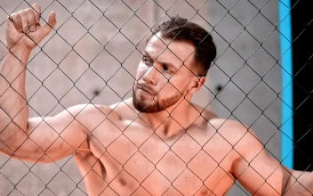 Stock Video A Shirtless Man Behind A Net In The Gym For PC