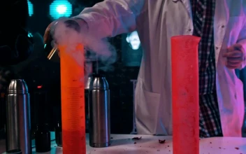 Stock Video A Scientist Pours The Liquid Nitrogen Into Flasks For PC