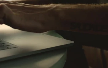 Stock Video A Persons Hands Typing On A Laptop For PC
