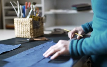 Stock Video A Person Working With Fabric For PC