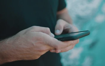 Stock Video A Person Texting On A Smartphone For PC