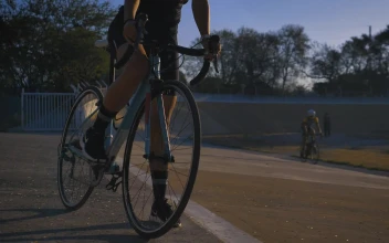 Stock Video A Person Riding A Bicycle To The Side Of A For PC