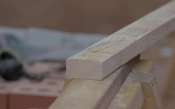 Stock Video A Person Measures A Block Of Wood For Construction For PC