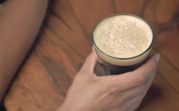 Stock Video A Person Drinks A Glass Of Beer For PC
