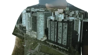 Stock Video A Person Crossing His Arms And A City With Tall For PC