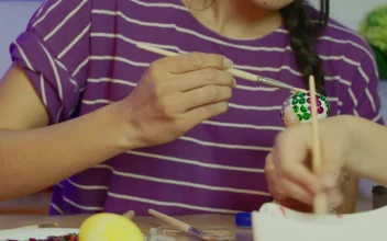 Stock Video A Mother And Her Daughter Preparing For Easter For PC