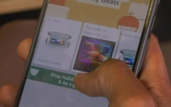 Stock Video A Mans Hand Scrolling On A Sales Page For PC