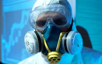 Stock Video A Man Wearing A Biohazard Suit And A Mask For PC