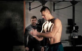 Stock Video A Man Training With Heavy Barbell In The Gym For PC